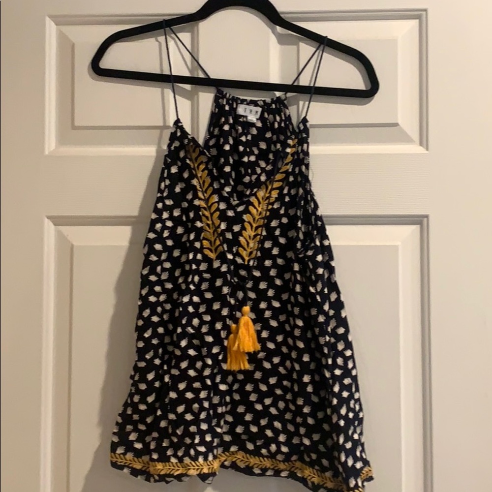 Adorable embroidered cami w/ tassel embellishment